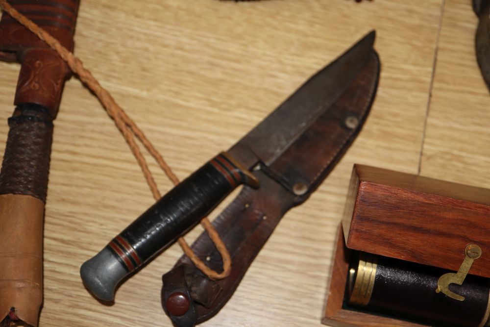 A quantity of mixed collectables including a planished pewter box, a draughtsman set, a large padlock and key, daggers etc